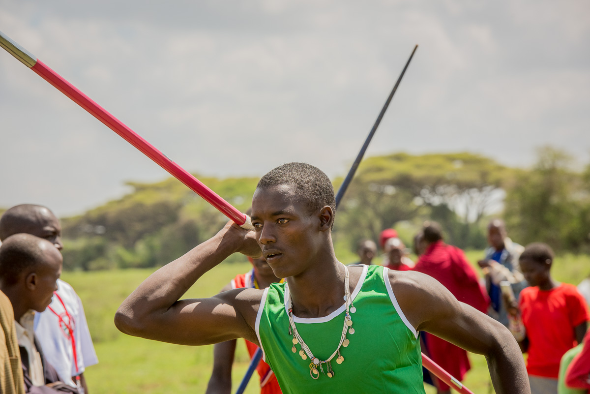 In the previous Maasai Olympics, the morans wore the traditional Maasai togas when competing in the events. This year, however, the contestants are required to wear solid brightly colored jersey tanks and shorts (when appropriate) during the competitions.